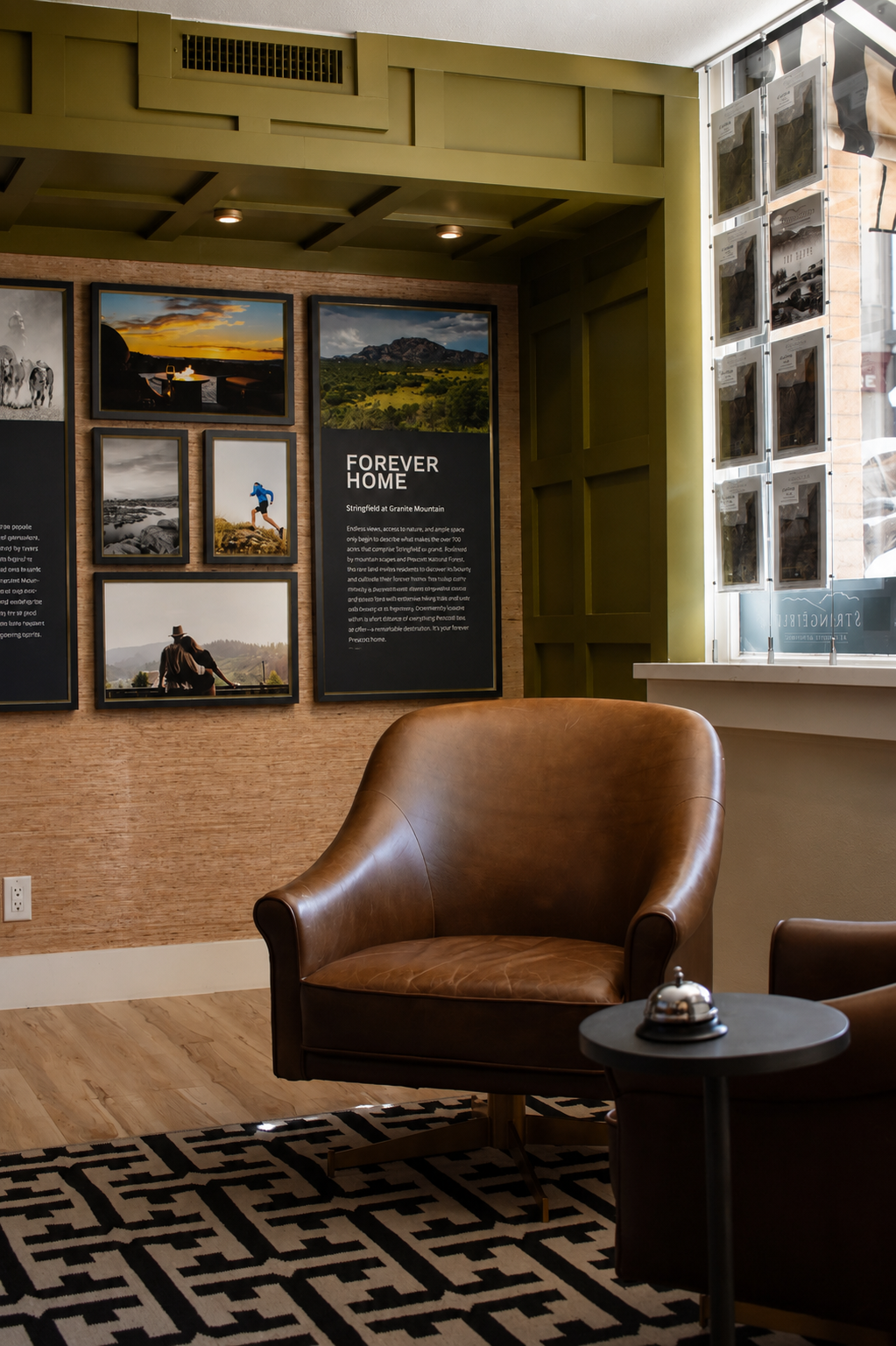 The lounge inside the Stringfield Sales Center, with leather seating set for visitors